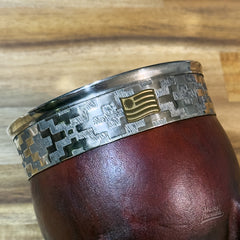 Dije en bronce